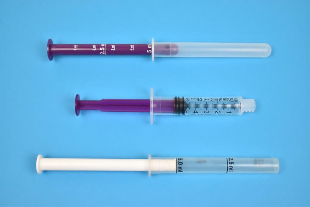 Examples of syringes used to give medicine to babies